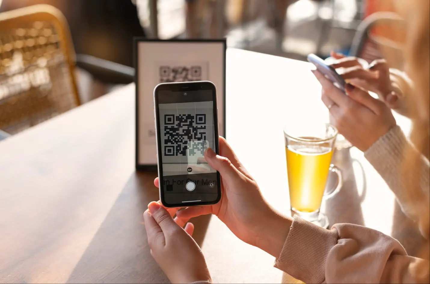 Guest scanning a QR code to open ordering